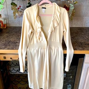 Sweet long vanilla colored sweater with great detail size M